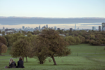 Breath-taking panoramic scenic view of London cityscape seen from beautiful Primrose Hill in St....