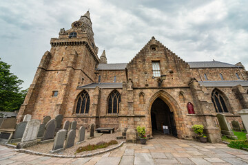 Fototapeta na wymiar St. Machar's Cathedral with cemetery at its gates and medieval construction, Aberdeen, Scotland.