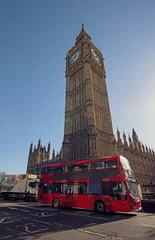 Keuken spatwand met foto London. Beautiful sky colors over Westminster and background the Big Ben  with Double Decker bus crossing the bridge. © Maria Aloisi