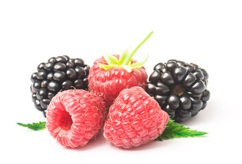 Ripe of raspberries and blackberries with leaves isolated on white background
- 641465646