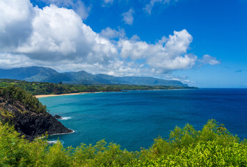 Fototapeta na wymiar Panorama of Kauai north coast coastline from Kauapea beach to Princeville and Hanalei on summers day