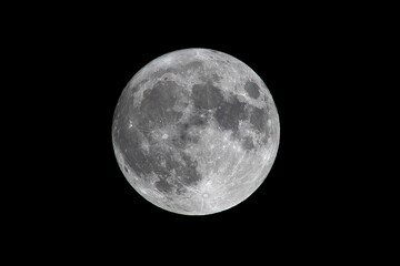 Snow moon. Super full moon with dark background. Madrid. Spain. Europe. Horizontal Photography. 24....