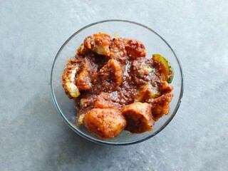 Batagor or food made from tofu is filled with dough made from flour and fish and then steamed. Batagor mixed with peanut sauce