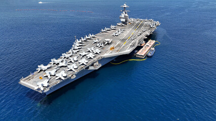 Aerial drone photo of latest technology nuclear powered aircraft carrier USS Gerald Ford anchored...