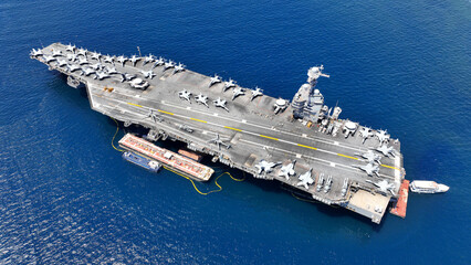 Aerial drone photo of latest technology American flag nuclear aircraft carrier USS Gerald Ford...