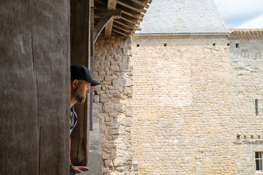Man looking out through the window