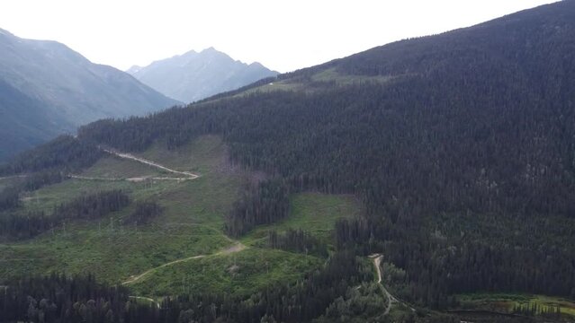 Beaver BC Canada Drone Nature Shot of Mountains, Trees, Kinbasket Lake, Highway, Mountains, Forest | Left Turn Sphere 270 Degree Showing Aerial Natural Valley Landscape