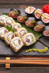Sushi set on a wooden background with ginger