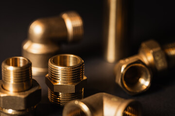 brass plumbing fittings in close-up (selective focus)