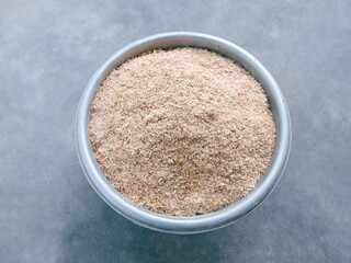 Paddy bran. Smooth rice husk on gray background