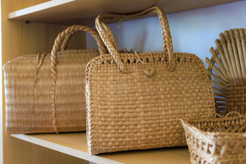 Straw woven bags. Background with selective focus and copy space