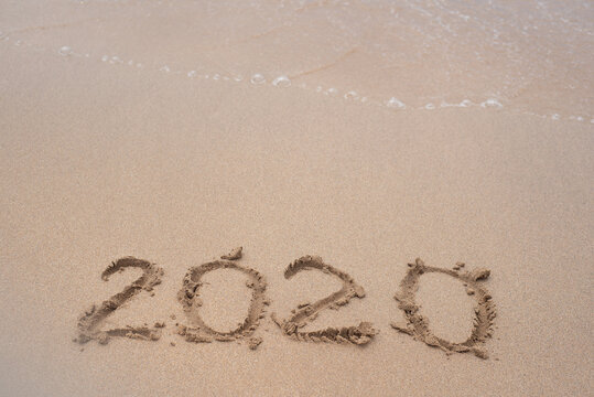 Drawing on wet sand 2020 on the beach in Georgia
