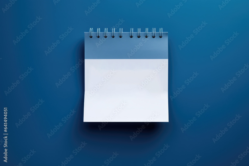 Poster simple image of blank notepad placed on blue background. perfect for use in office or creative proje