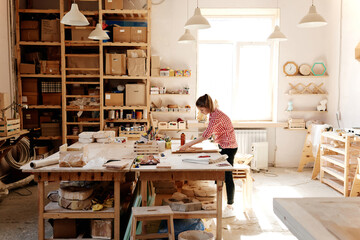 Wood designer working in studio