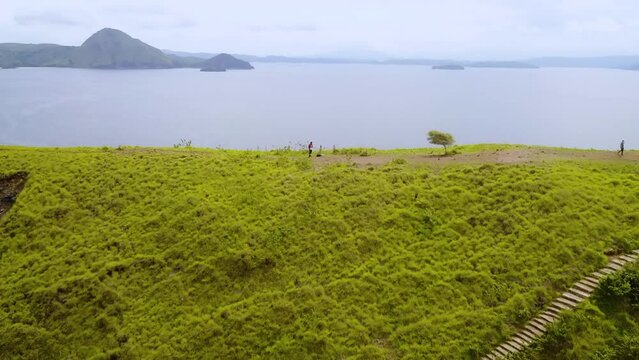 Aerial View Padar Island, Labuan Bajo, Indonesia. Capturing ocean and beautiful landscape of sky, hills and coastal beach.