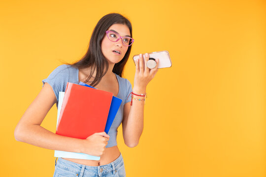 Student listening a voice message on the phone