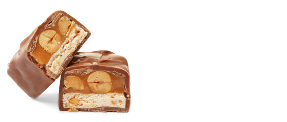 Tasty chocolate bar with nuts cut in half on white background, space for text