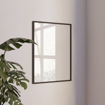 Simple Minimalist Frame Mockup Poster Hanging On The White Wall With Plant Decoration