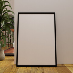minimalist frame mockup poster on the floor leaning on the white wall with plant as a decoration