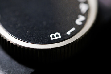 macro photo of a camera shutter dial