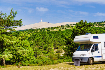 Caravan in mountains. Mont Ventoux in the distance. Provance
