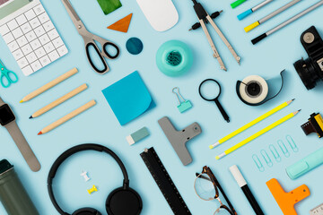 Office supply, stationary flat lay on blue background