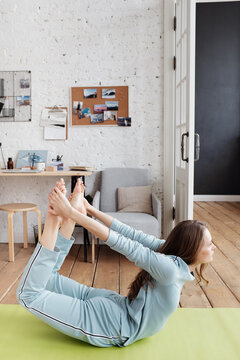 Woman stretching in Bow Pose