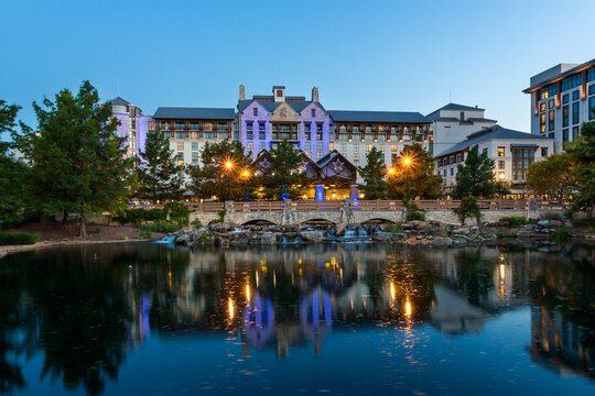 Beautiful Gaylord Texan Resort building over a stone bridge at twilight
