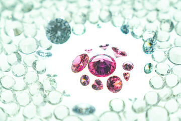 .Pink gemstones is displayed on a white background swirling around..Pink diamonds of various sizes...