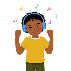 Little African boy listening to music with headphone