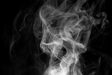 creative photo of white smoke on black background