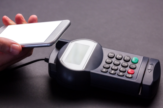 Digital png illustration of hand paying using smartphone on transparent background