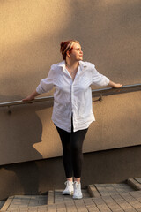 Beautiful Pretty Plus Size 20s Woman, Gentle Zoomer At Evening Soft Light Smile Outdoor on Beige...