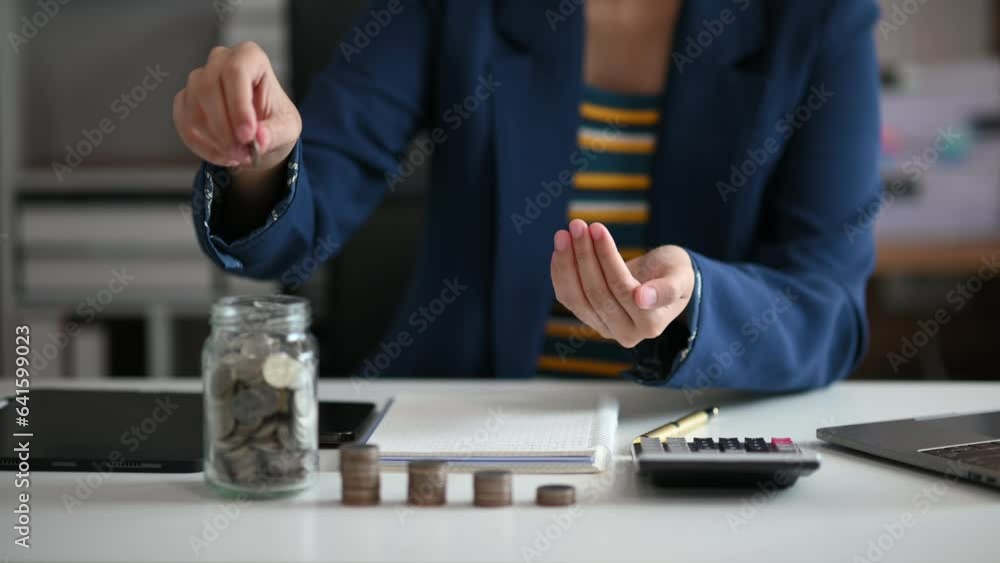 Poster businessman holding coins putting in glass with using smartphone and calculator to calculate concept