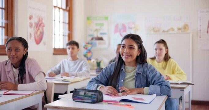 Hands raised, girl and students in high school, learning and study in classroom. Group education, teenager and answer question, asking why and development of knowledge for children listening together