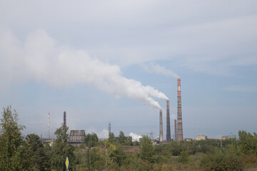 Air pollution. Smoke from factory pipes