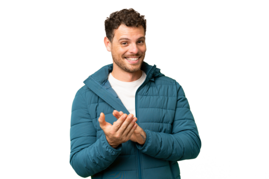 Brazilian man over isolated chroma key background applauding after presentation in a conference