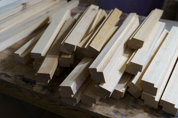 Woodworking wooden bars in the workshop. Private business, timber concept.