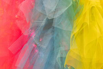 Vibrant Textured Net Fabric: Pretty Fabric with Different Colors and Patterns for Striking Background Use.