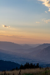Mountain layers of The Chartreuse mountains and Grésivaudan valley in french alps at sunset.