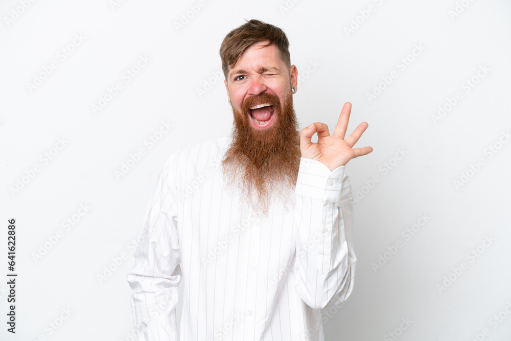 Wall mural Redhead man with long beard isolated on white background showing ok sign with fingers