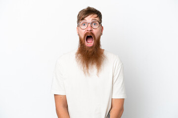 Redhead man with long beard isolated on white background with surprise facial expression