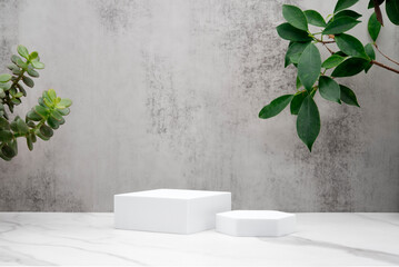 Product background with geometric shapes, gray textured stone wall, white marble table. Minimalist...
