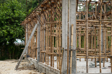 Bamboo scaffolding or crutches in traditional residential construction background