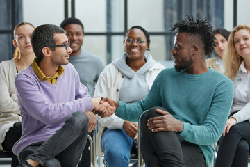 People in casual clothes in the meeting room
