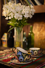 A cup of aromatic coffee in a white cup in a cafe on a table
