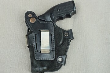 iron heavy short dangerous on rubber bullets of black color pocket short modern 9 mm revolver in a...