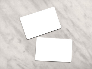 Double-sided business card template with rounded edges on a gray marble background. Business card...