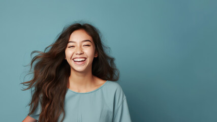 Fototapeta premium Hispanic teen, brown hair, blue theme