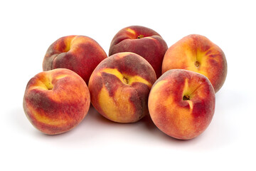 Fresh peaches, isolated on white background.